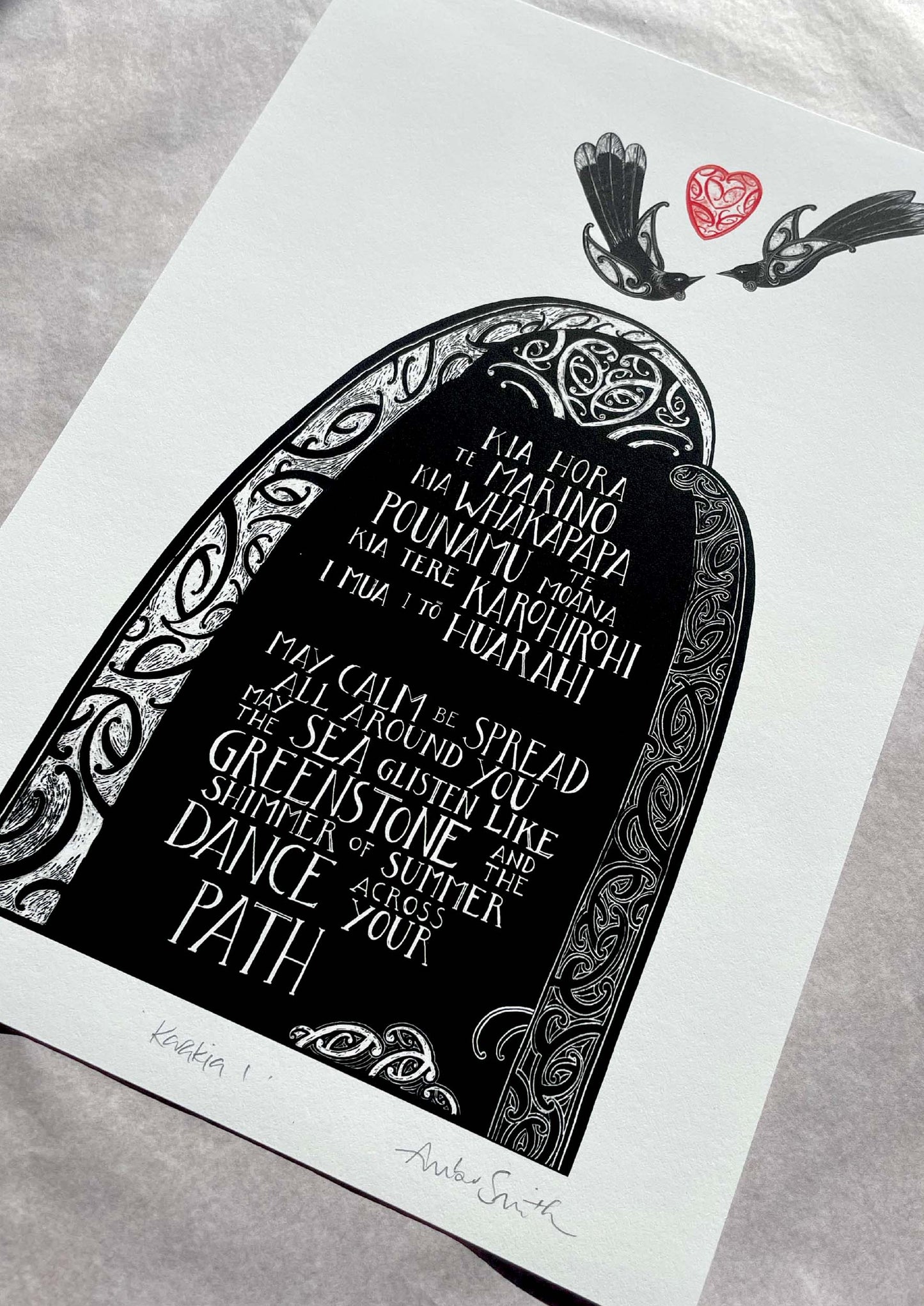 Karakia 1 print with maori art design tui birds and aroha heart . May calm spread all around you, may the sea glisten like greenstone, and the shimmer of summer dance across your path. Kia horo te marino blessing. words are in te reo Maori and english translation. By Amber Smith nz artist.