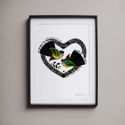 Framed pīwakawaka love art print, Aroha Pīwakawaka – My Love for You Will Never Fade, featuring fantails and a te reo Māori message about enduring love.
