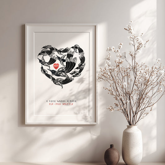 Framed Aotearoa tūī art print, E Rere Wairua – Fly Free, Spirit Fly, featuring a gathering of tūī flying together in the shape of a heart, symbolising love, letting go and the enduring connection with someone who has passed away.