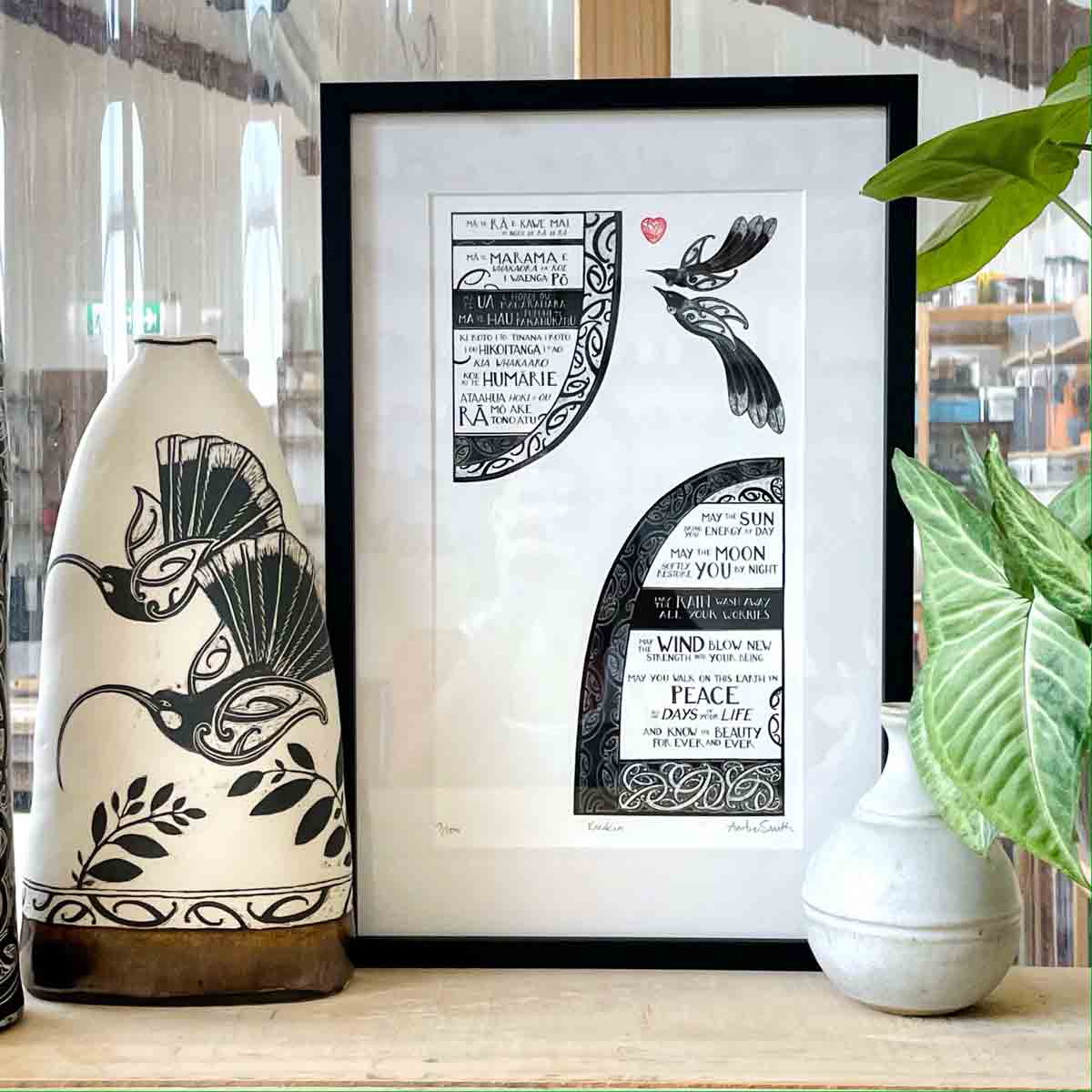 framed favourite nz art print with maori art tui and blessing may the sun bring you energy by day by nz artist amber smith