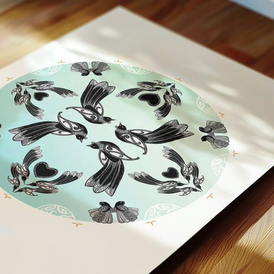 New Zealand bird art print, Manu Mandala by Amber Smith, featuring tūī and pīwakawaka flying together in a circular mandala against a hazy blue background, reflecting the beauty of Aotearoa’s native birds. Close up detail.