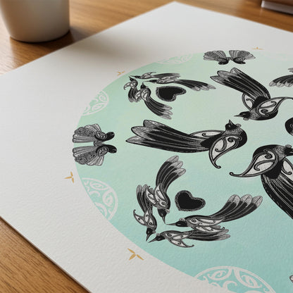 New Zealand bird art print, Manu Mandala by Amber Smith, featuring tūī and pīwakawaka flying together in a circular mandala against a hazy blue background, reflecting the beauty of Aotearoa’s native birds. Close up detail.