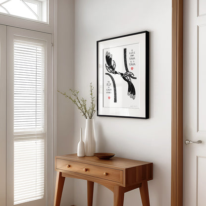 New Zealand tūī art print, We Fly to Each Other, featuring tūī birds and aroha hearts, with a message in te reo Māori and English about finding your way back to each other and being together again. Framed living room art.