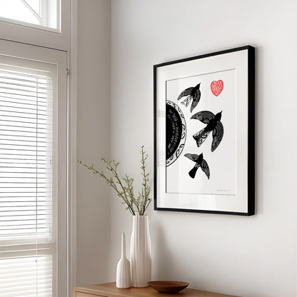 Framed New Zealand bird art print, You Have the Wings to Fly, featuring birds in flight with kōwhaiwhai and koru patterns woven through their feathers, inspired by a te reo Māori whakataukī about having the wings to fly. 